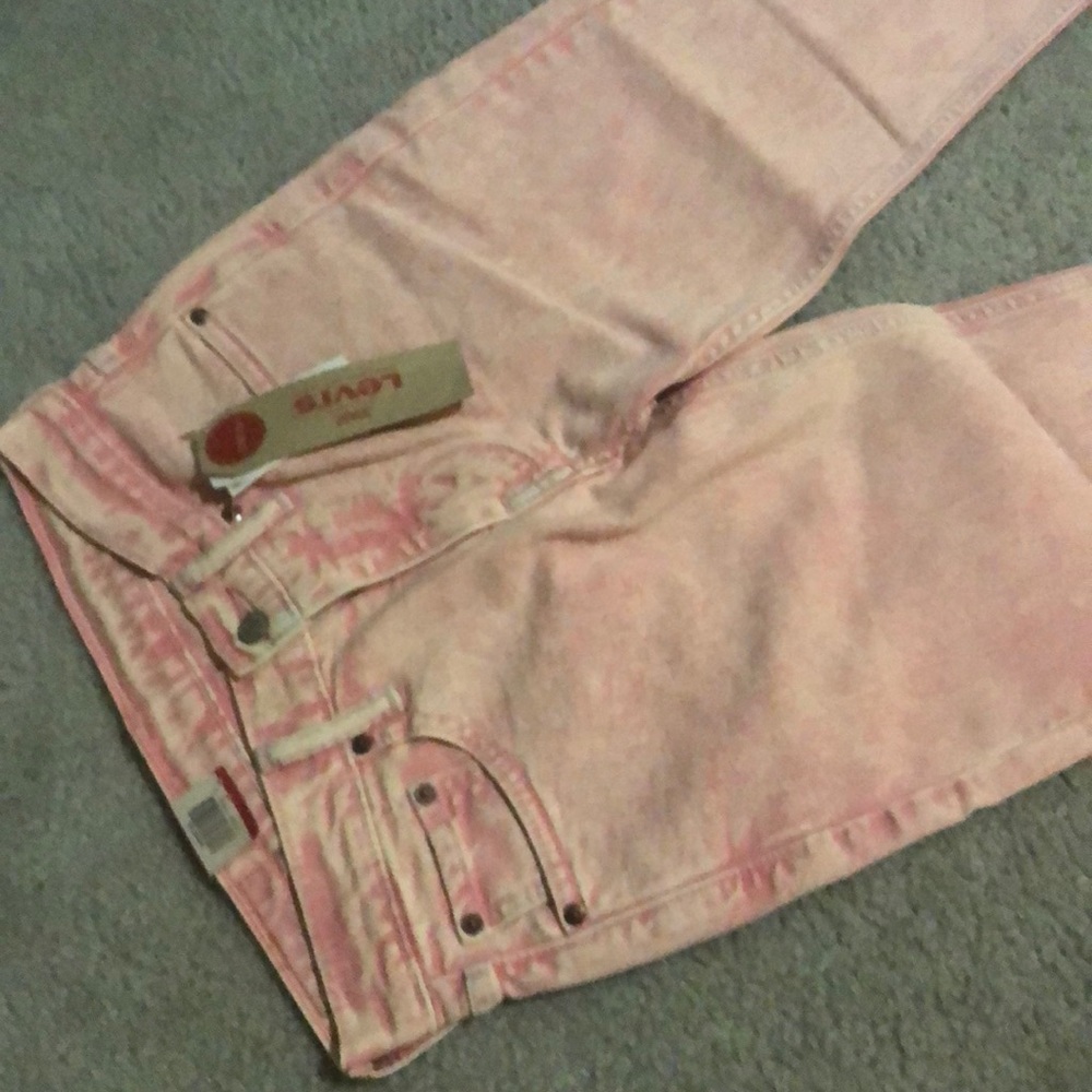 Pink stonewashed Levi jeans